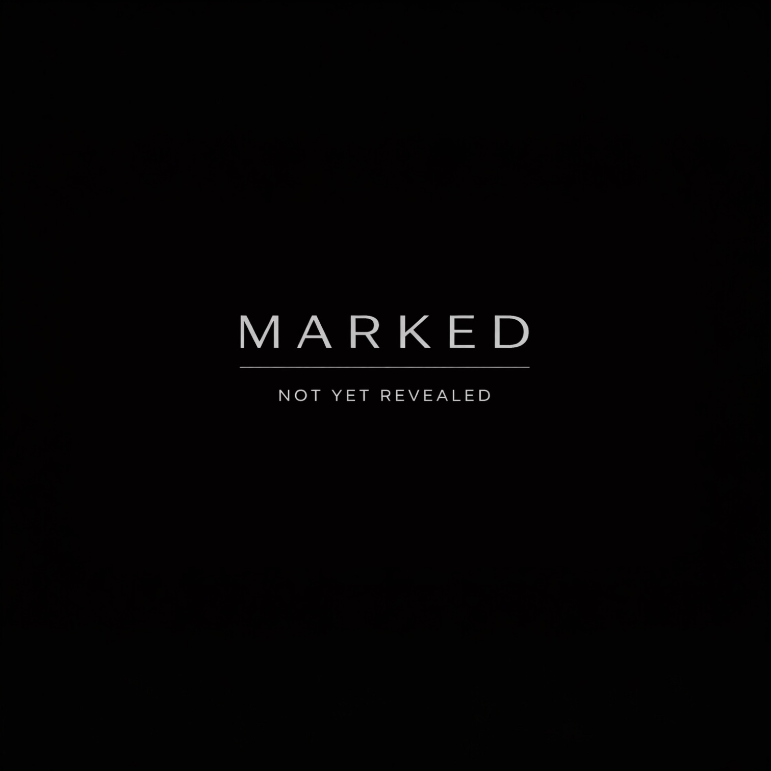Black background with white text 'MARKED NOT YET REVEALED'