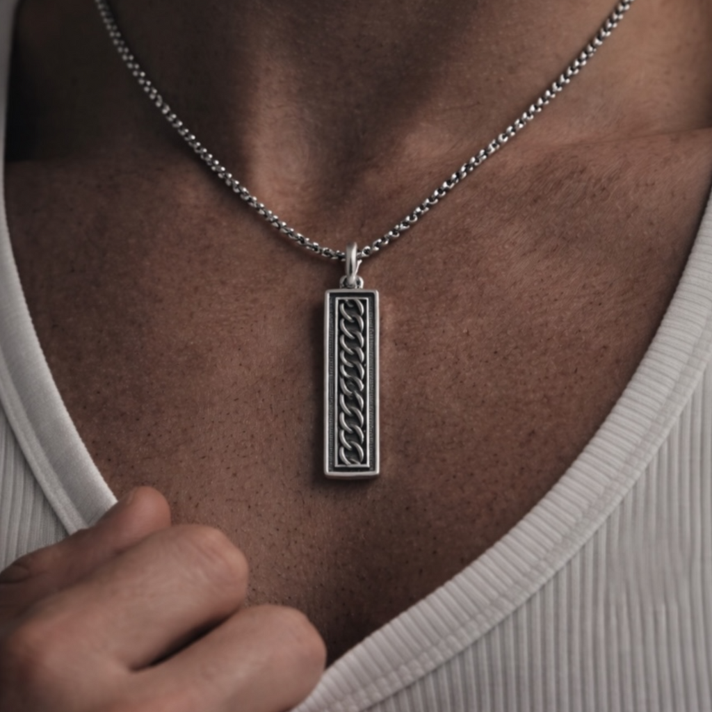 Sterling silver ingot pendant on micro belcher chain worn on chest, UNMARKED jewellery